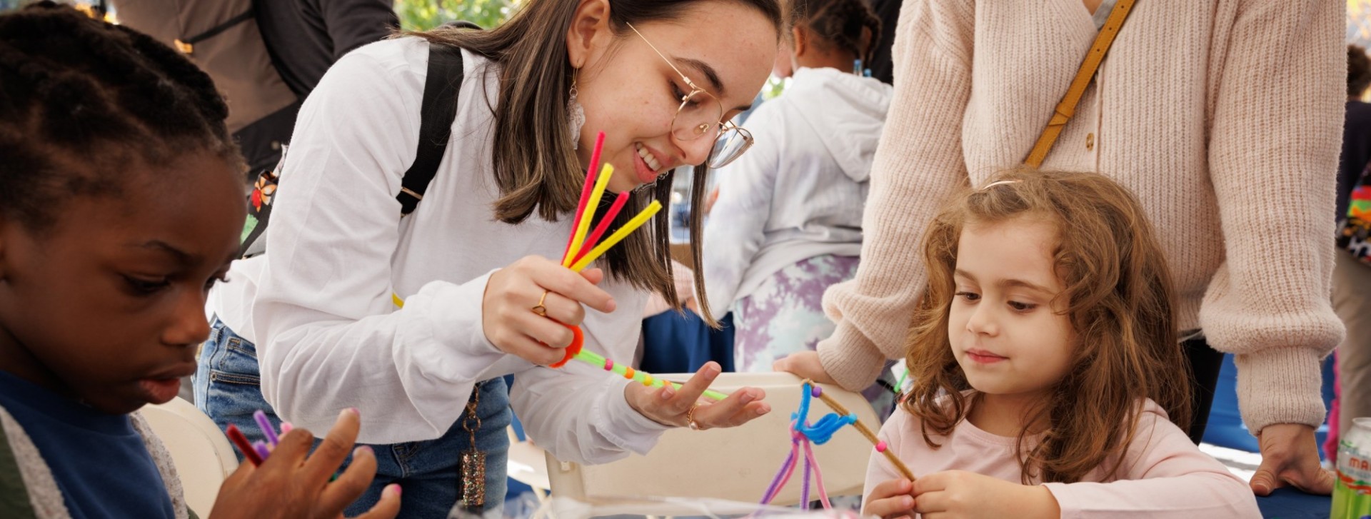 Scientist-teacher guiding activity for children.